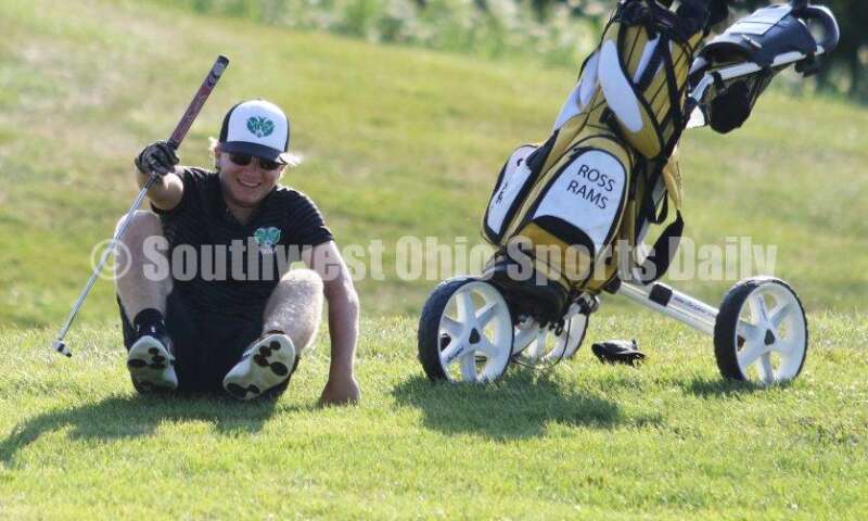 Badin High School's Brady Reichart is about to rise to take a shot Aug. 15, 2019, during a dual golf match against Ross at Indian Ridge Golf Club. RICK CASSANO/STAFF