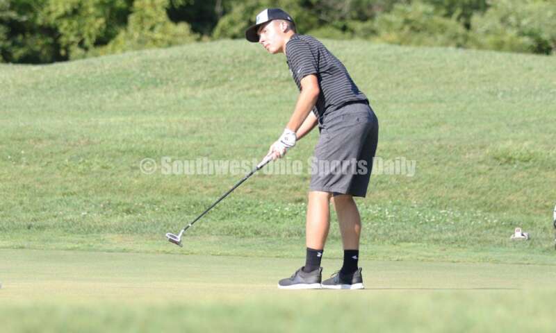 Badin High School's Andrew Schwartz strikes a putt Aug. 15, 2019, during a dual golf match against Ross at Indian Ridge Golf Club. RICK CASSANO/STAFF