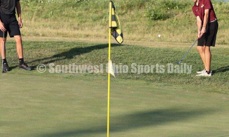 Ross High School's Nick Chernock chips onto the green Aug. 15, 2019, during a dual golf match against Badin at Indian Ridge Golf Club. RICK CASSANO/STAFF