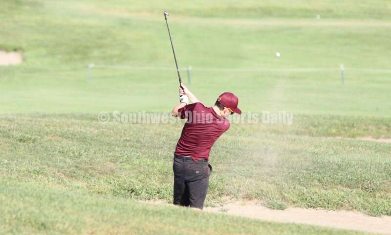Ross High School's Adam Fisher hits out of a sand trap Aug. 15, 2019, during a dual golf match against Badin at Indian Ridge Golf Club. RICK CASSANO/STAFF