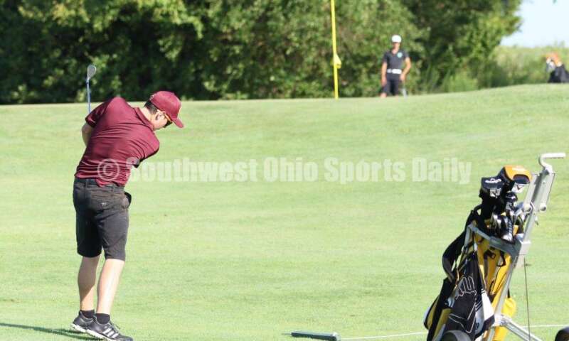 Ross High School's Adam Fisher sends a shot toward the green Aug. 15, 2019, during a dual golf match against Badin at Indian Ridge Golf Club. RICK CASSANO/STAFF