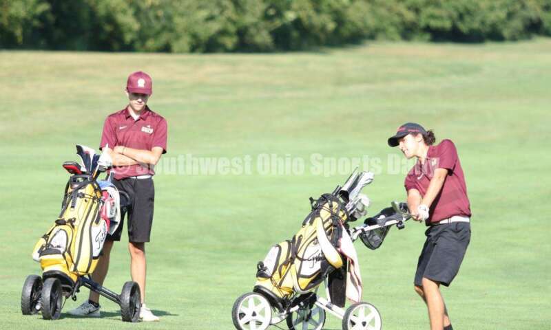 Ross High School's Ben Hannon swings toward the green Aug. 15, 2019, during a dual golf match against Badin at Indian Ridge Golf Club. RICK CASSANO/STAFF