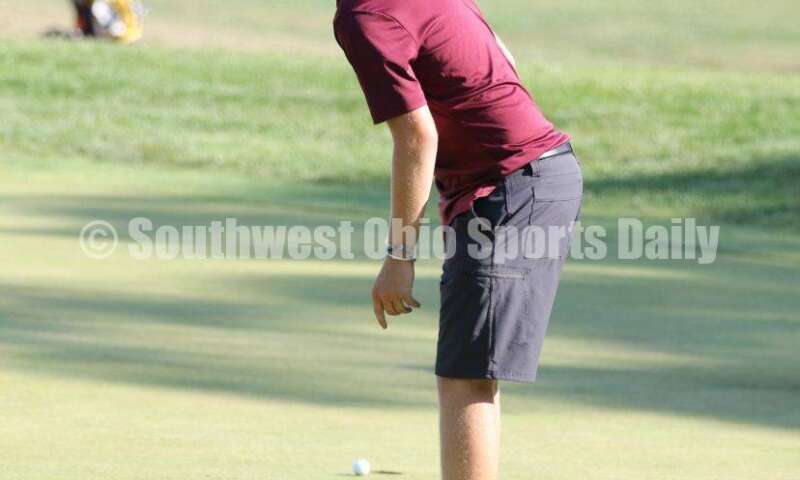 Ross High School's Logan Hollander tries to coax the ball into the hole Aug. 15, 2019, during a dual golf match against Badin at Indian Ridge Golf Club. RICK CASSANO/STAFF