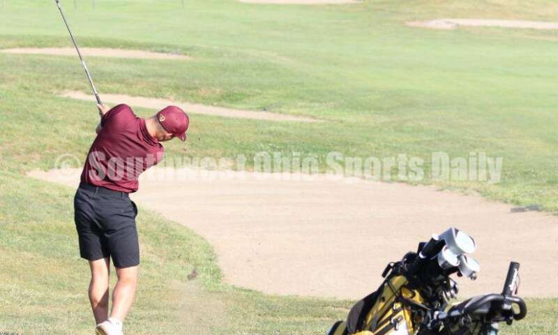 Ross High School's Trent Kist sends a shot toward the green Aug. 15, 2019, during a dual golf match against Badin at Indian Ridge Golf Club. RICK CASSANO/STAFF