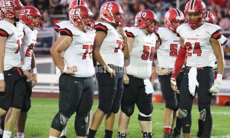 Madison High School quarterback Quincy Brown (24) looks to the sideline for the offensive call Oct. 3, 2019, during a Southwestern Buckeye League football game at Dixie. The visiting Mohawks won 48-13. RICK CASSANO/STAFF