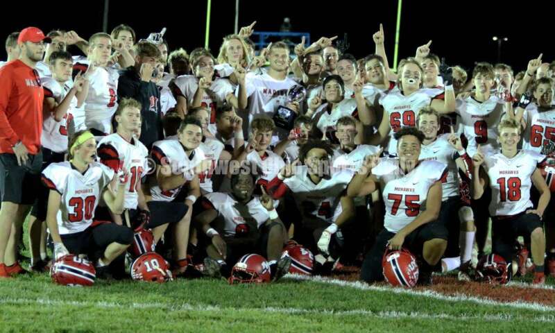 Madison High School's football team poses for the cameras Oct. 3, 2019, after a Southwestern Buckeye League football game at Dixie. The visiting Mohawks won 48-13. RICK CASSANO/STAFF