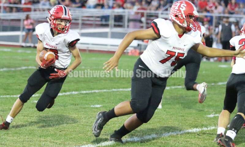 Madison High School's Preston Brown (75) blocks for Chase Patrick on Oct. 3, 2019, during a Southwestern Buckeye League football game at Dixie. The visiting Mohawks won 48-13. RICK CASSANO/STAFF