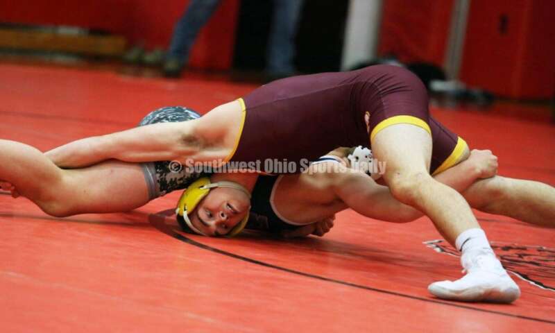 Ross High School's Sean Beltran is on top of Blanchester's Gage Berwanger at 152 pounds Jan. 13, 2021, during a dual wrestling match at New Richmond. RICK CASSANO/STAFF