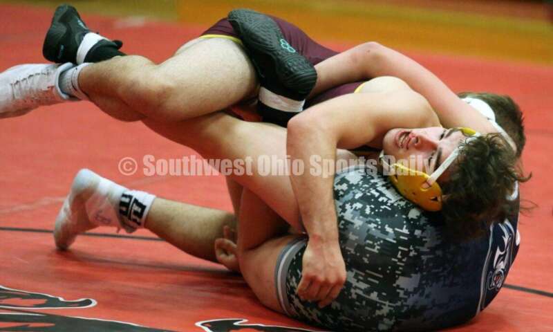 Ross High School's Sean Beltran (top) controls Blanchester's Gage Berwanger at 152 pounds Jan. 13, 2021, during a dual wrestling match at New Richmond. RICK CASSANO/STAFF