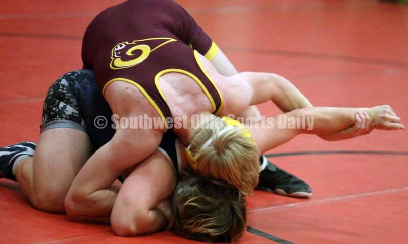 Ross High School's Ethan Boyle controls Blanchester's Adam Frump at 160 pounds Jan. 13, 2021, during a dual wrestling match at New Richmond. RICK CASSANO/STAFF