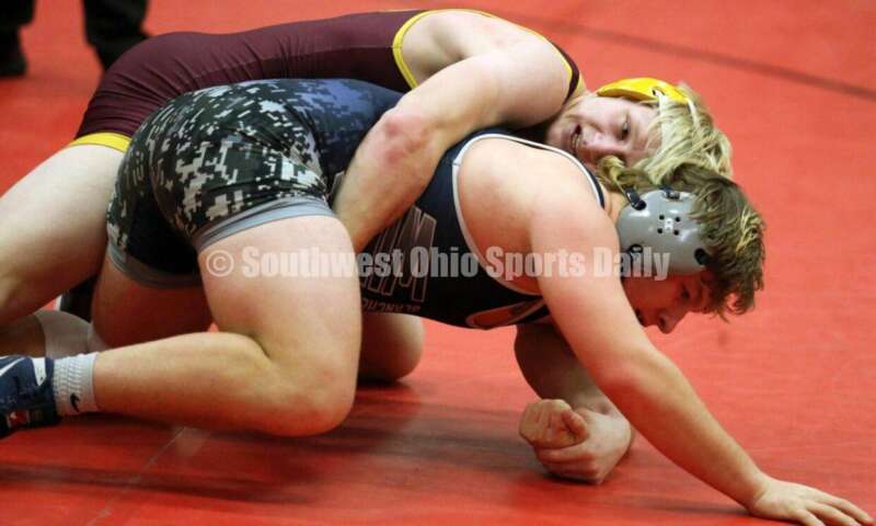 Ross High School's Ethan Boyle grips Blanchester's Adam Frump at 160 pounds Jan. 13, 2021, during a dual wrestling match at New Richmond. RICK CASSANO/STAFF