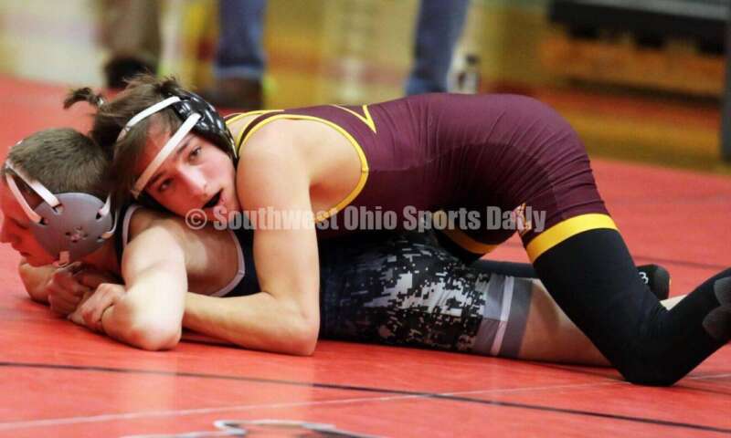 Ross High School's Jovanni Greco is on top of Blanchester's Hunter Smith at 106 pounds Jan. 13, 2021, during a dual wrestling match at New Richmond. RICK CASSANO/STAFF