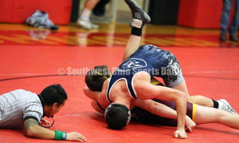 Blanchester High School's Gage Huston pins Hayduke Hess of Ross at 170 pounds Jan. 13, 2021, during a dual wrestling match at New Richmond. RICK CASSANO/STAFF