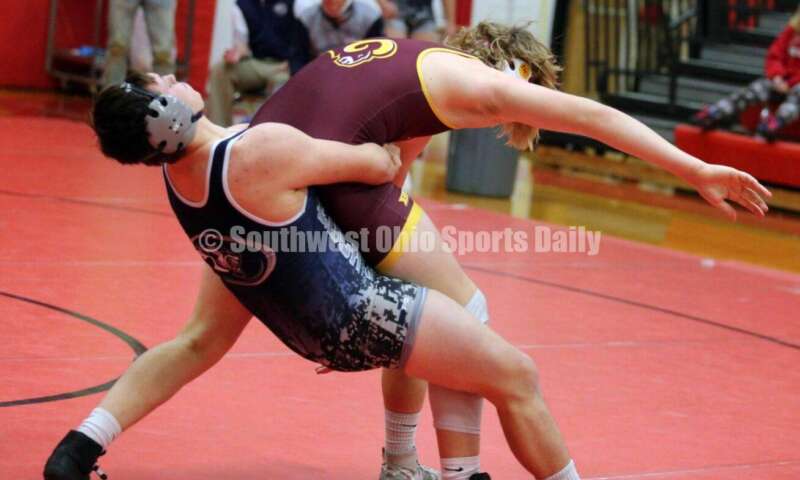 Blanchester High School's Jacob Lanham grabs Ryan Iams of Ross at 195 pounds Jan. 13, 2021, during a dual wrestling match at New Richmond. RICK CASSANO/STAFF