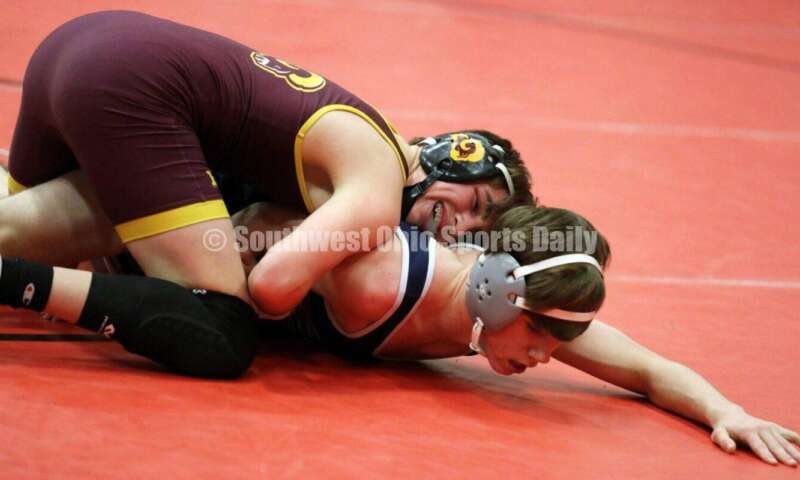 Ross High School's Austin Parker controls Blanchester's Dylan Short at 126 pounds Jan. 13, 2021, during a dual wrestling match at New Richmond. RICK CASSANO/STAFF