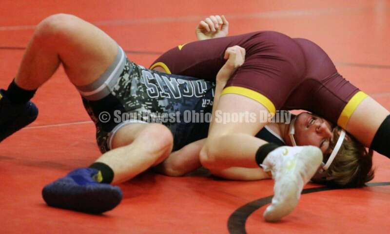 Ross High School's Austin Parker controls Blanchester's Dylan Short at 126 pounds Jan. 13, 2021, during a dual wrestling match at New Richmond. RICK CASSANO/STAFF