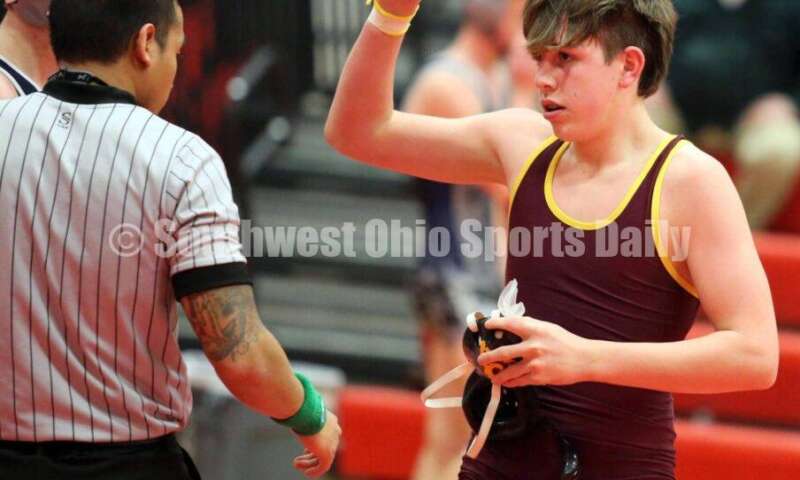 Ross High School's Austin Parker wins against Blanchester's Dylan Short at 126 pounds Jan. 13, 2021, during a dual wrestling match at New Richmond. RICK CASSANO/STAFF