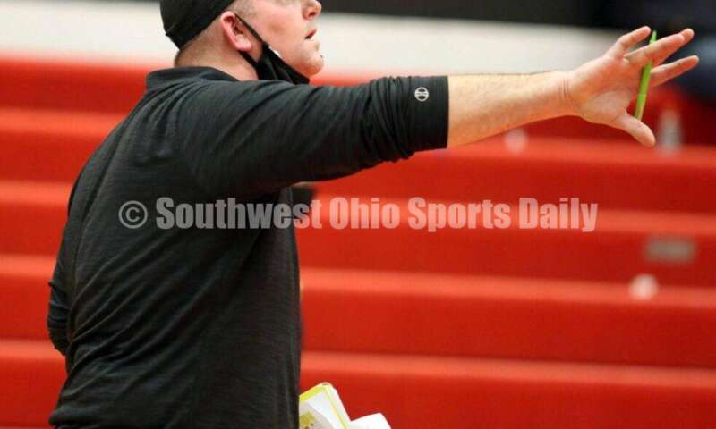 Ross High School assistant coach Brian Sawyers calls out instructions Jan. 13, 2021, during a dual wrestling match against Blanchester at New Richmond. RICK CASSANO/STAFF