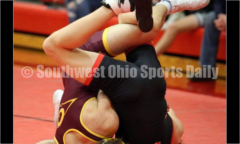 Ross High School's Sean Beltran (left) competes with New Richmond's Griffin Ross at 152 pounds Jan. 13, 2021, during a dual wrestling match at New Richmond. RICK CASSANO/STAFF