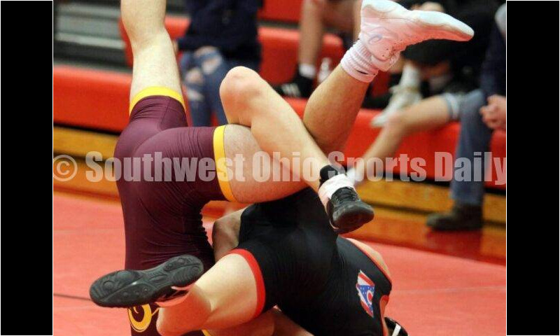 Ross High School's Sean Beltran (left) competes with New Richmond's Griffin Ross at 152 pounds Jan. 13, 2021, during a dual wrestling match at New Richmond. RICK CASSANO/STAFF