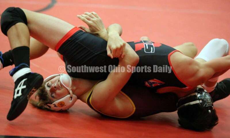 Ross High School's Jaiden Earls has a grip on New Richmond's Lexington Hounshell at 120 pounds Jan. 13, 2021, during a dual wrestling match at New Richmond. RICK CASSANO/STAFF