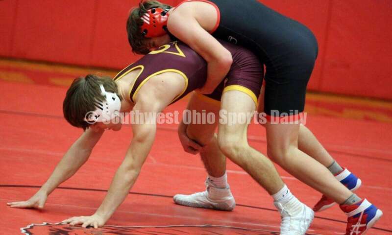 New Richmond High School's Derrick Klinker gets on top of Ryan Foster of Ross at 132 pounds Jan. 13, 2021, during a dual wrestling match at New Richmond. RICK CASSANO/STAFF
