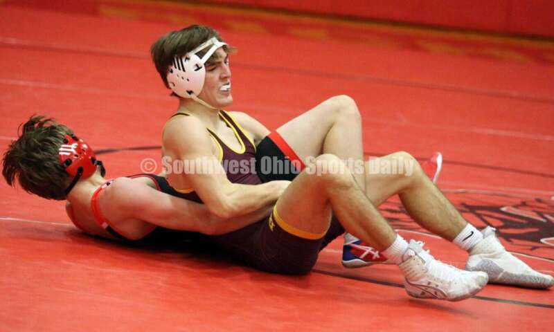 Ross High School's Ryan Foster is on top of New Richmond's Derrick Klinker at 132 pounds Jan. 13, 2021, during a dual wrestling match at New Richmond. RICK CASSANO/STAFF