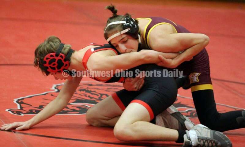 Ross High School's Jovanni Greco (right) competes with New Richmond's Dillon Jacobs at 113 pounds Jan. 13, 2021, during a dual wrestling match at New Richmond. RICK CASSANO/STAFF