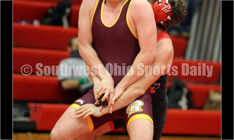 Ross High School's Hayduke Hess tries to escape the grip of New Richmond's Chad Tracy at 170 pounds Jan. 13, 2021, during a dual wrestling match at New Richmond. RICK CASSANO/STAFF