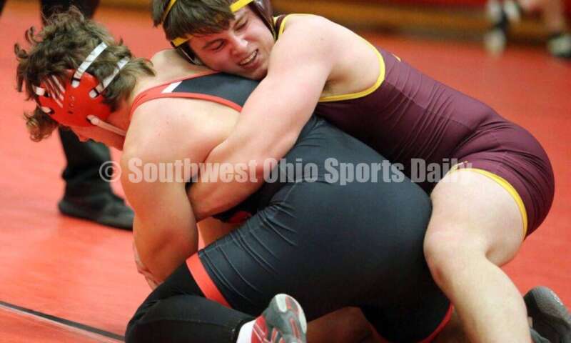 Ross High School's Hayduke Hess (right) battles New Richmond's Chad Tracy at 170 pounds Jan. 13, 2021, during a dual wrestling match at New Richmond. RICK CASSANO/STAFF