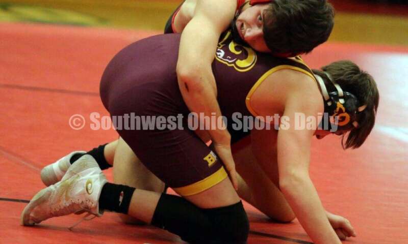 New Richmond High School's Zachary Rostetter gets a grip on Austin Parker of Ross at 126 pounds Jan. 13, 2021, during a dual wrestling match at New Richmond. RICK CASSANO/STAFF