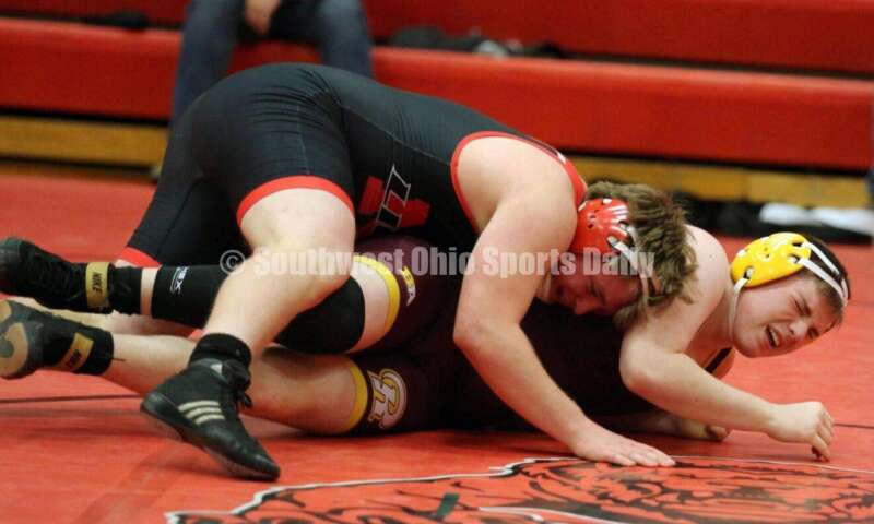 Ross High School's Matt Roach (right) competes with New Richmond's Charles Miller at 195 pounds Jan. 13, 2021, during a dual wrestling match at New Richmond. RICK CASSANO/STAFF