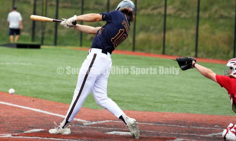 Badin High School's Cooper Fiehrer connects with the ball for Sluggers Baseball Club on June 25, 2021, during Pastime Tournaments' Ohio Valley 17U/18U Wood Bat Classic at New Richmond. The Sluggers lost to the Cincinnati Impact 3-2. RICK CASSANO/STAFF