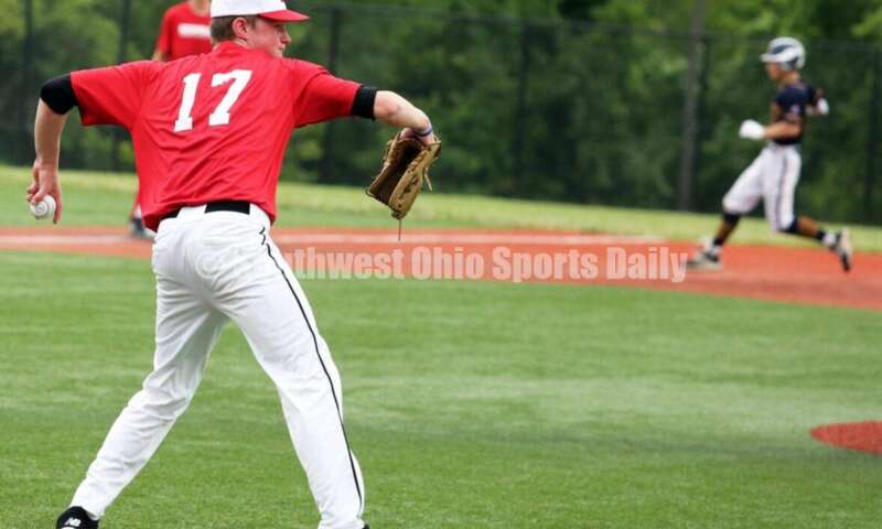 Lakota West High School's Connor Crowley picks up a bunt and throws to first base for the Cincinnati Impact on June 25, 2021, during Pastime Tournaments' Ohio Valley 17U/18U Wood Bat Classic at New Richmond. The Impact beat Sluggers Baseball Club 3-2. RICK CASSANO/STAFF