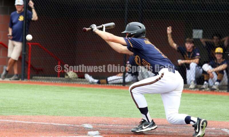Badin High School's Mark Holderbach bunts the ball for Sluggers Baseball Club on June 25, 2021, during Pastime Tournaments' Ohio Valley 17U/18U Wood Bat Classic at New Richmond. The Sluggers lost to the Cincinnati Impact 3-2. RICK CASSANO/STAFF