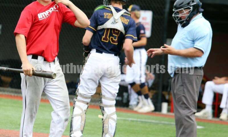 Lakota East High School's Will Becker reacts to a pitch for the Cincinnati Impact on June 25, 2021, during Pastime Tournaments' Ohio Valley 17U/18U Wood Bat Classic at New Richmond. The Impact beat Sluggers Baseball Club 3-2. RICK CASSANO/STAFF