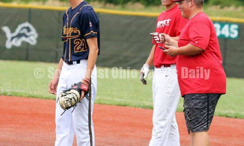 Lakota West High School's Brady Weber reacts to a hit at first base for the Cincinnati Impact on June 25, 2021, during Pastime Tournaments' Ohio Valley 17U/18U Wood Bat Classic at New Richmond. The Impact beat Sluggers Baseball Club 3-2. RICK CASSANO/STAFF