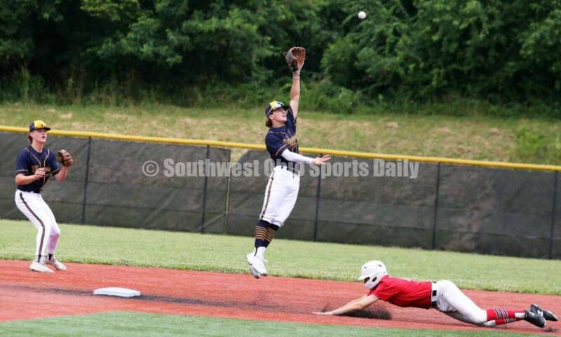 Edgewood High School's Kaden Davidson reaches for a throw for Sluggers Baseball Club as Lakota West's Ethan Vaught slides into second base for the Cincinnati Impact on June 25, 2021, during Pastime Tournaments' Ohio Valley 17U/18U Wood Bat Classic at New Richmond. The Sluggers lost to the Impact 3-2. RICK CASSANO/STAFF
