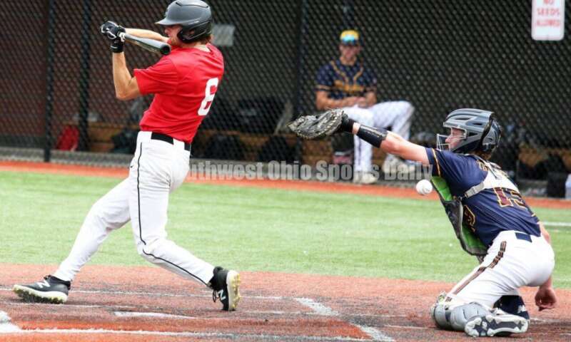 Lakota East High School's Kyle Stoughton checks his swing for the Cincinnati Impact on June 25, 2021, during Pastime Tournaments' Ohio Valley 17U/18U Wood Bat Classic at New Richmond. The Impact beat Sluggers Baseball Club 3-2. RICK CASSANO/STAFF
