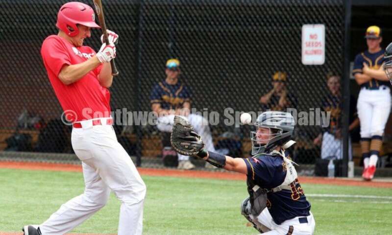 Lakota West High School's Brady Weber gets hit by a pitch for the Cincinnati Impact in front of Edgewood's Jesse Thompson of Sluggers Baseball Club on June 25, 2021, during Pastime Tournaments' Ohio Valley 17U/18U Wood Bat Classic at New Richmond. The Impact won 3-2. RICK CASSANO/STAFF