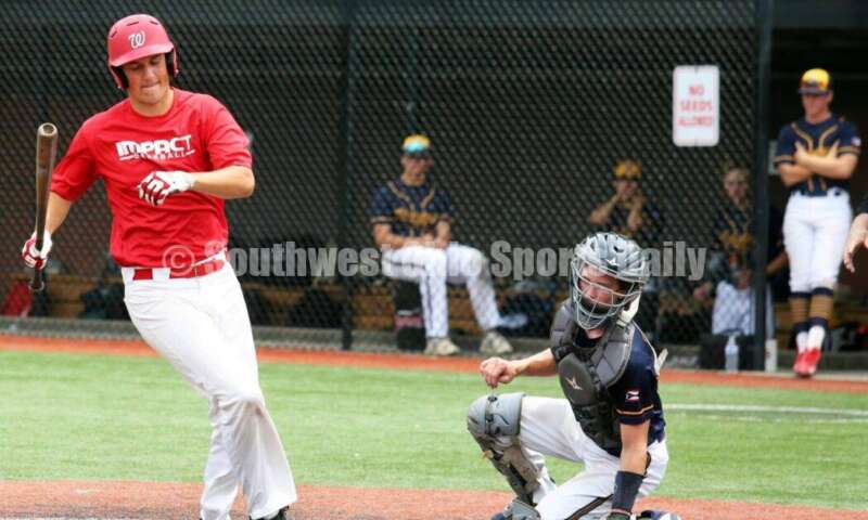 Lakota West High School's Brady Weber gets hit by a pitch for the Cincinnati Impact in front of Edgewood's Jesse Thompson of Sluggers Baseball Club on June 25, 2021, during Pastime Tournaments' Ohio Valley 17U/18U Wood Bat Classic at New Richmond. The Impact won 3-2. RICK CASSANO/STAFF