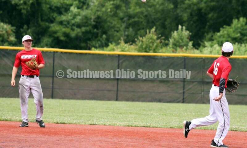Villa Madonna (Ky.) Academy's Colin McLagan (16) flips the ball to Lakota East's Will Becker for the Cincinnati Impact on June 25, 2021, during Pastime Tournaments' Ohio Valley 17U/18U Wood Bat Classic at New Richmond. The Impact beat Sluggers Baseball Club 3-2. RICK CASSANO/STAFF