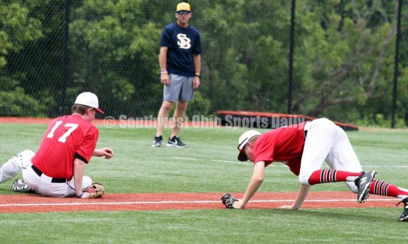 Lakota West High School's Ethan Vaught tries to coax a bunt into foul territory for the Cincinnati Impact on June 25, 2021, during Pastime Tournaments' Ohio Valley 17U/18U Wood Bat Classic at New Richmond. The Impact beat Sluggers Baseball Club 3-2. RICK CASSANO/STAFF