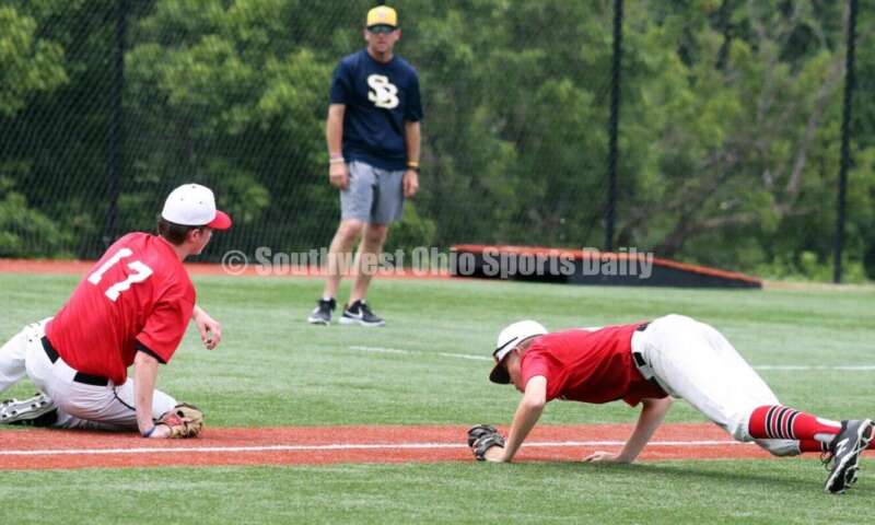 Lakota West High School's Ethan Vaught tries to coax a bunt into foul territory for the Cincinnati Impact on June 25, 2021, during Pastime Tournaments' Ohio Valley 17U/18U Wood Bat Classic at New Richmond. The Impact beat Sluggers Baseball Club 3-2. RICK CASSANO/STAFF