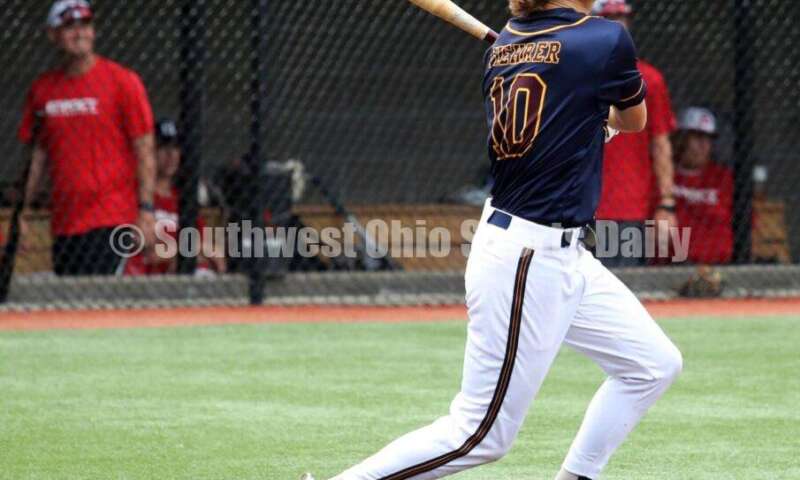 Badin High School's Cooper Fiehrer connects with the ball for Sluggers Baseball Club on June 25, 2021, during Pastime Tournaments' Ohio Valley 17U/18U Wood Bat Classic at New Richmond. The Sluggers lost to the Cincinnati Impact 3-2. RICK CASSANO/STAFF