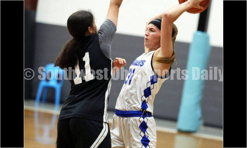 Ross High School's Veronica Allen is defended July 10, 2021, during the Cincy Chargers' game against the Maryland Blazers in a matchup of 17-year-old girls basketball teams in the USJN's Midwest Summer Challenge at Sports Plus in Evendale. The Chargers won 58-31. RICK CASSANO/STAFF
