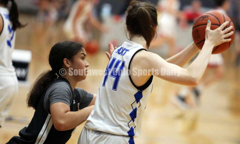 Beavercreek High School's Hannah Hunt is defended July 10, 2021, during the Cincy Chargers' game against the Maryland Blazers in a matchup of 17-year-old girls basketball teams in the USJN's Midwest Summer Challenge at Sports Plus in Evendale. The Chargers won 58-31. RICK CASSANO/STAFF
