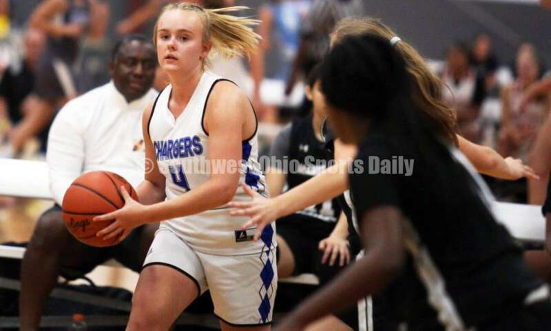 Edgewood High School's Jessica Moore (4) is about to make a pass July 10, 2021, during the Cincy Chargers' game against the Maryland Blazers in a matchup of 17-year-old girls basketball teams in the USJN's Midwest Summer Challenge at Sports Plus in Evendale. The Chargers won 58-31. RICK CASSANO/STAFF