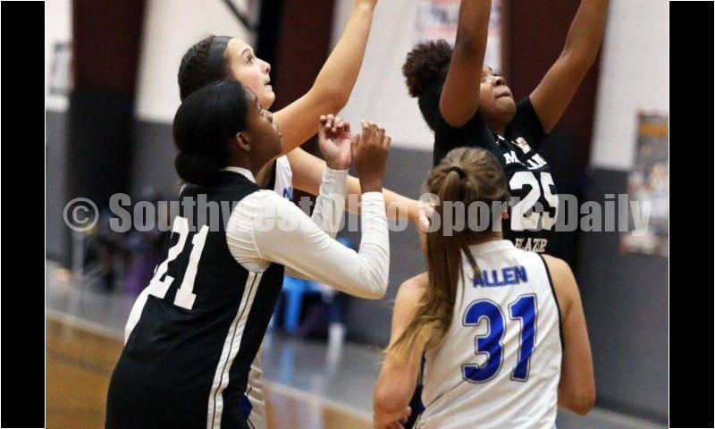 Ross High School's Veronica Allen (31) and Emily Doerman work down low July 10, 2021, during the Cincy Chargers' game against the Maryland Blazers in a matchup of 17-year-old girls basketball teams in the USJN's Midwest Summer Challenge at Sports Plus in Evendale. The Chargers won 58-31. RICK CASSANO/STAFF