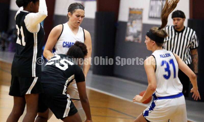 Ross High School's Veronica Allen (31) and Lakota West's Emily Doerman work defensively July 10, 2021, during the Cincy Chargers' game against the Maryland Blazers in a matchup of 17-year-old girls basketball teams in the USJN's Midwest Summer Challenge at Sports Plus in Evendale. The Chargers won 58-31. RICK CASSANO/STAFF